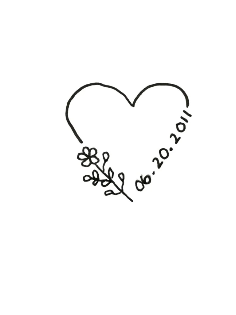 Heart with a flower and date as part of the shape.
